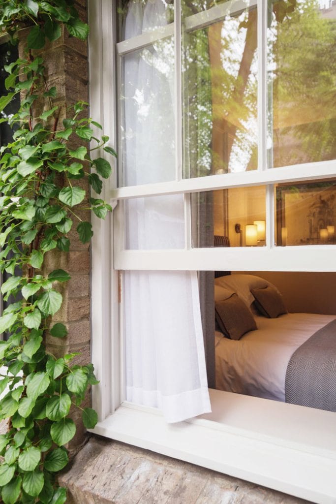 0025 - 2014 - Old Parsonage Hotel - Oxford - Low Res - Bedroom Window Greenery - Web Feature