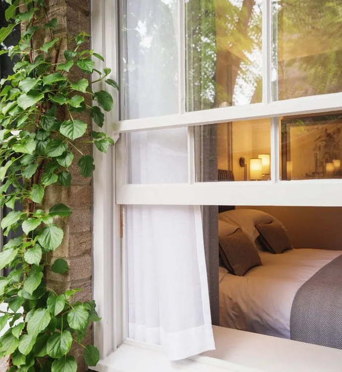 0025 &ndash; 2014 &ndash; Old Parsonage Hotel &ndash; Oxford &ndash; Low Res &ndash; Bedroom Window Greenery &ndash; Web Feature