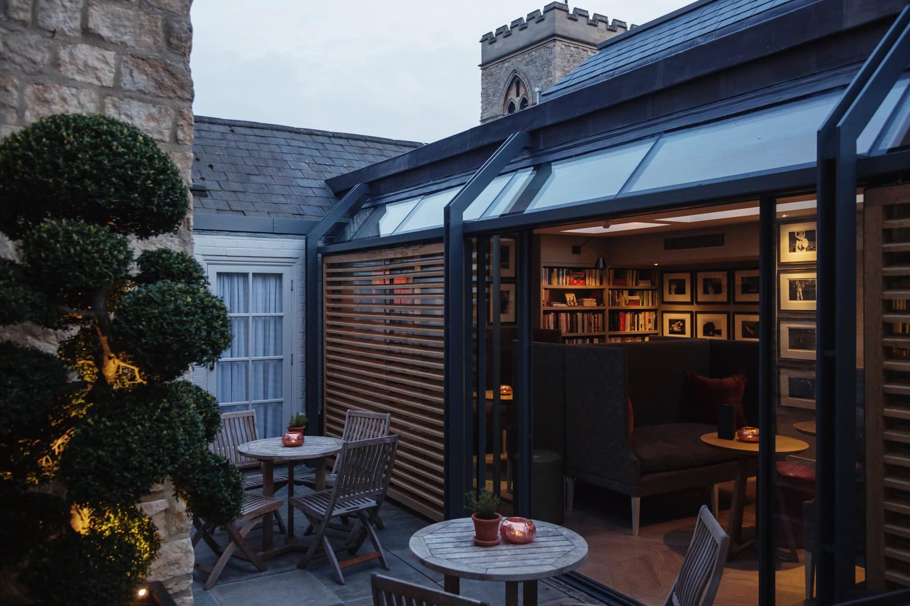 0036 - 2014 - Old Parsonage Hotel - Oxford - Low Res - Library Exterior Terrace Evening - Web Hero